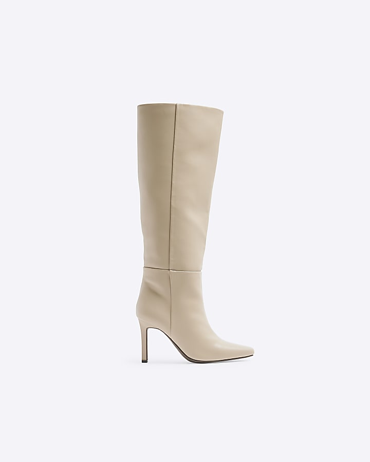 Beige heeled high leg boots