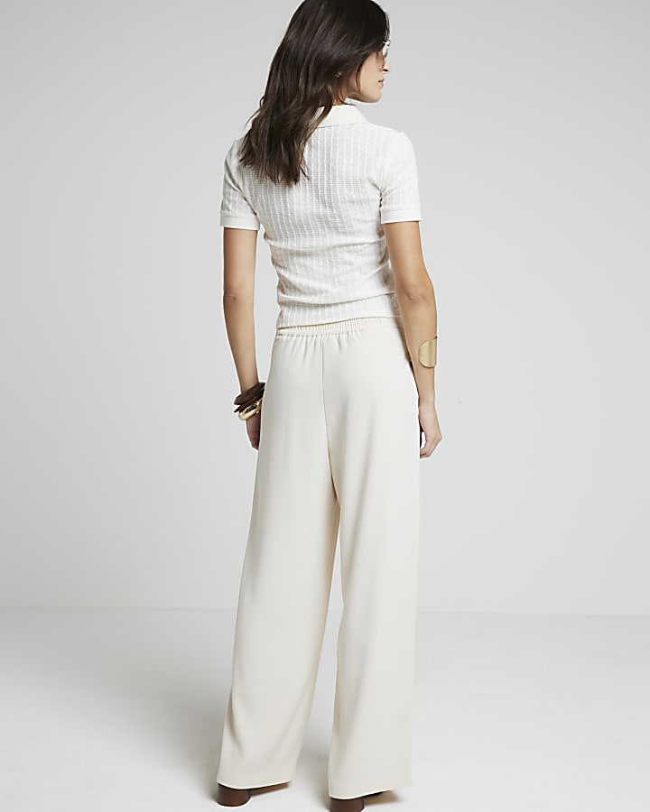 Cream wide leg trousers