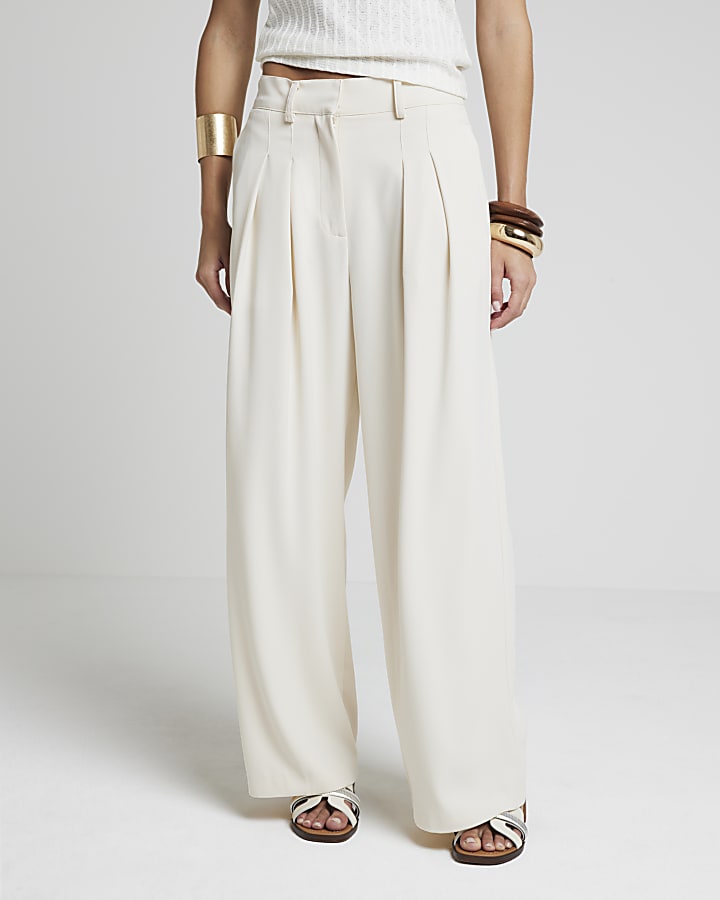 Cream wide leg trousers