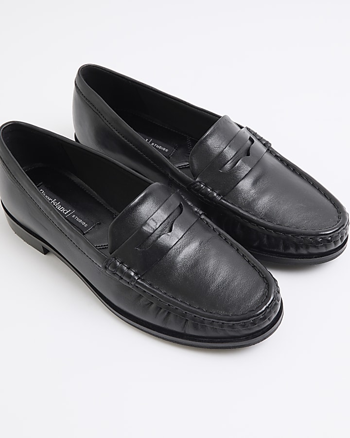 Black leather loafers