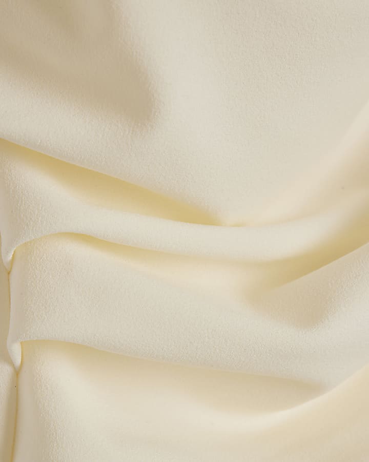 Cream off shoulder drape top