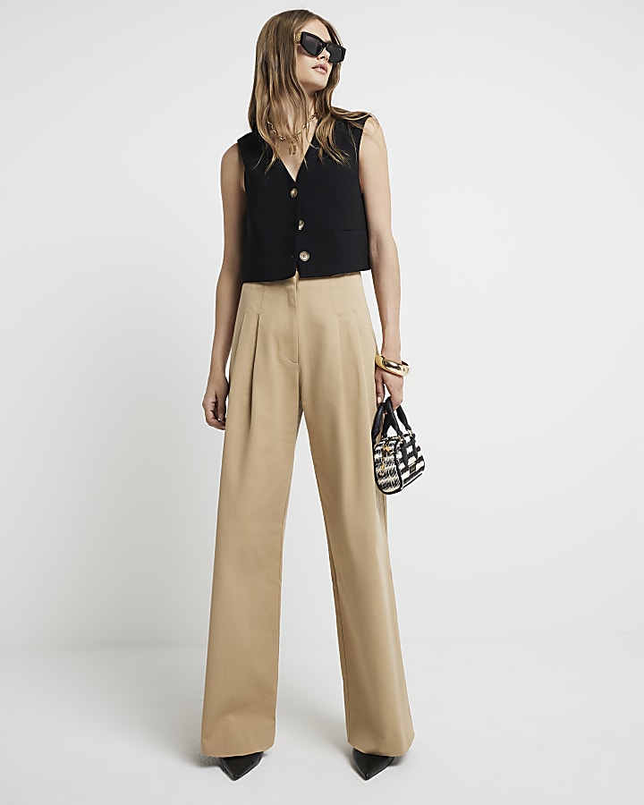 Beige high waisted wide leg trousers