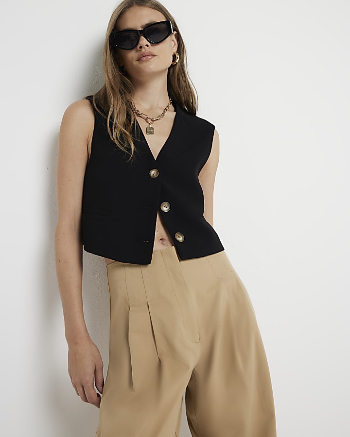 Beige high waisted wide leg trousers