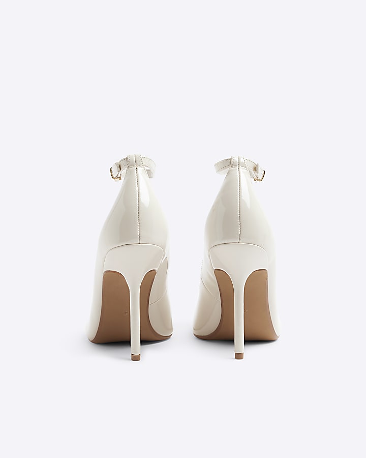 Cream ankle strap heeled court shoes
