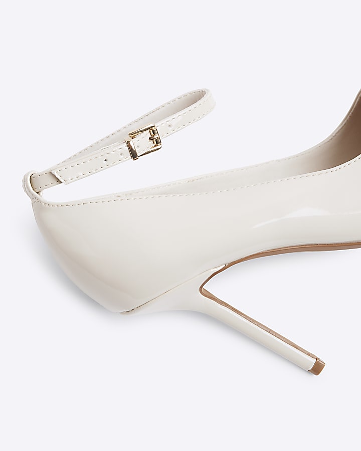 Cream ankle strap heeled court shoes