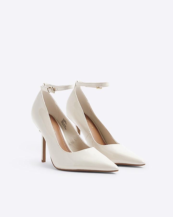 Cream ankle strap heeled court shoes
