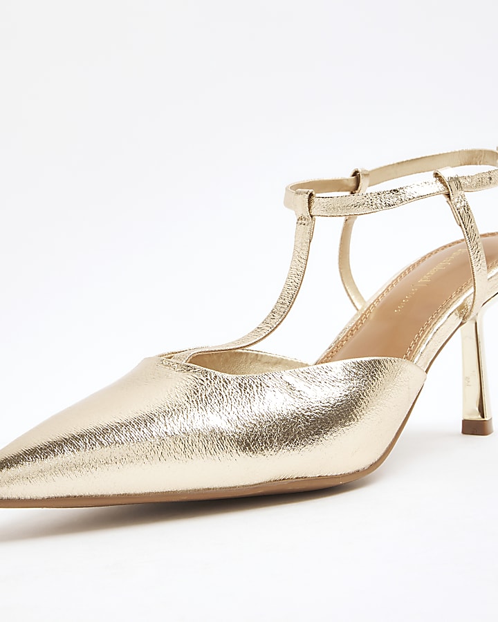 Gold sling back heeled court shoes