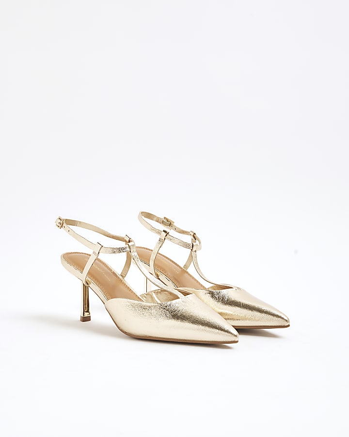 Gold sling back heeled court shoes