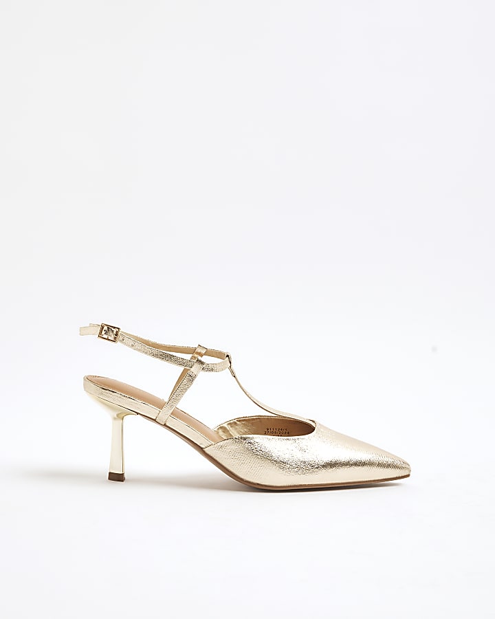 Gold sling back heeled court shoes