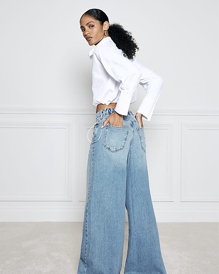 Blue mid rise elastic back palazzo jeans