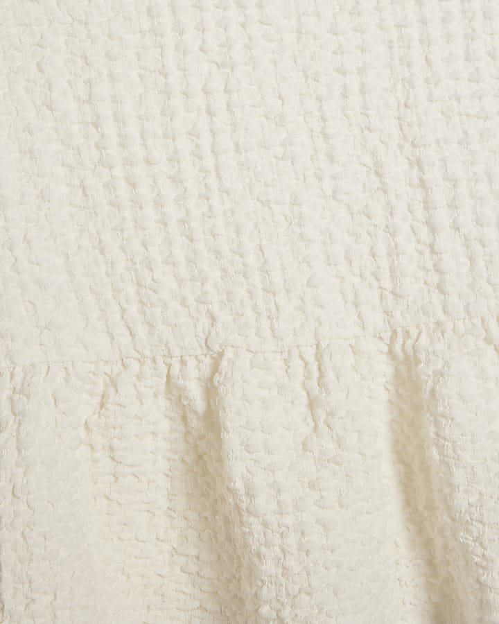 Cream textured peplum t-shirt