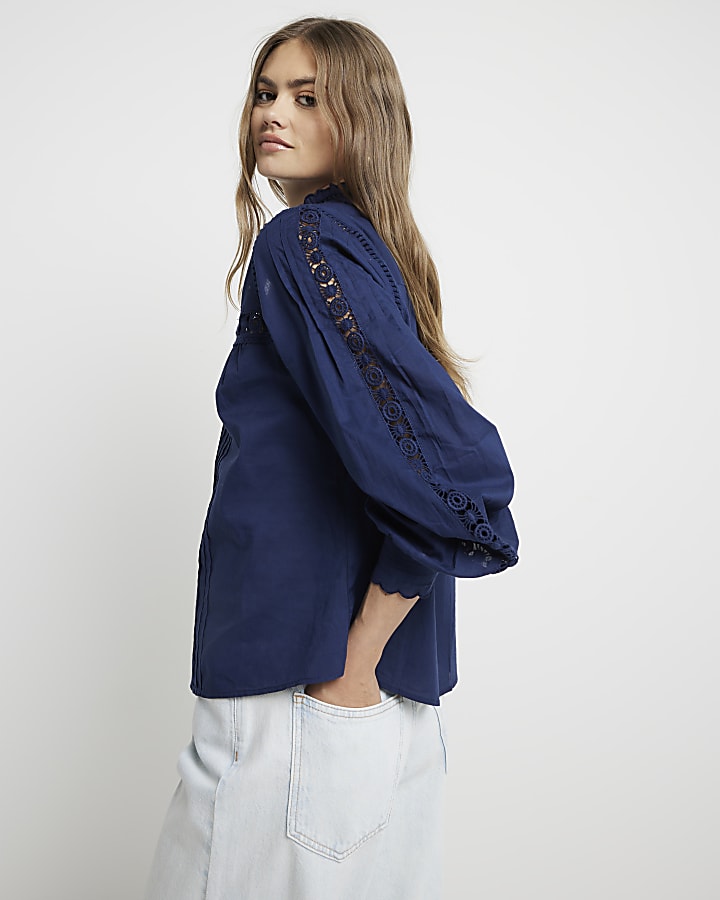 Navy pleated smock broderie blouse