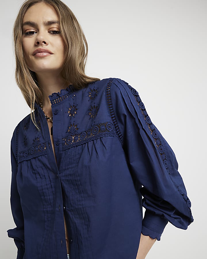 Navy pleated smock broderie blouse