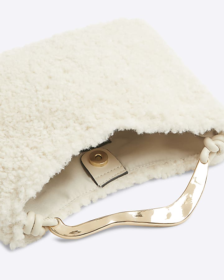 Beige borg hardware handle clutch bag