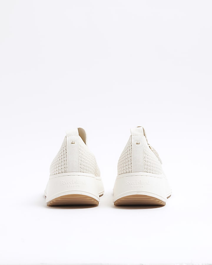 Beige knit wedge trainers