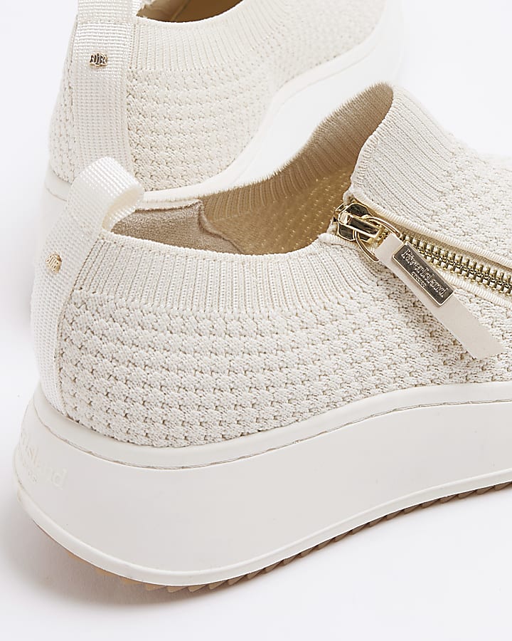 Beige knit wedge trainers