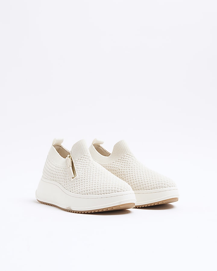Beige knit wedge trainers