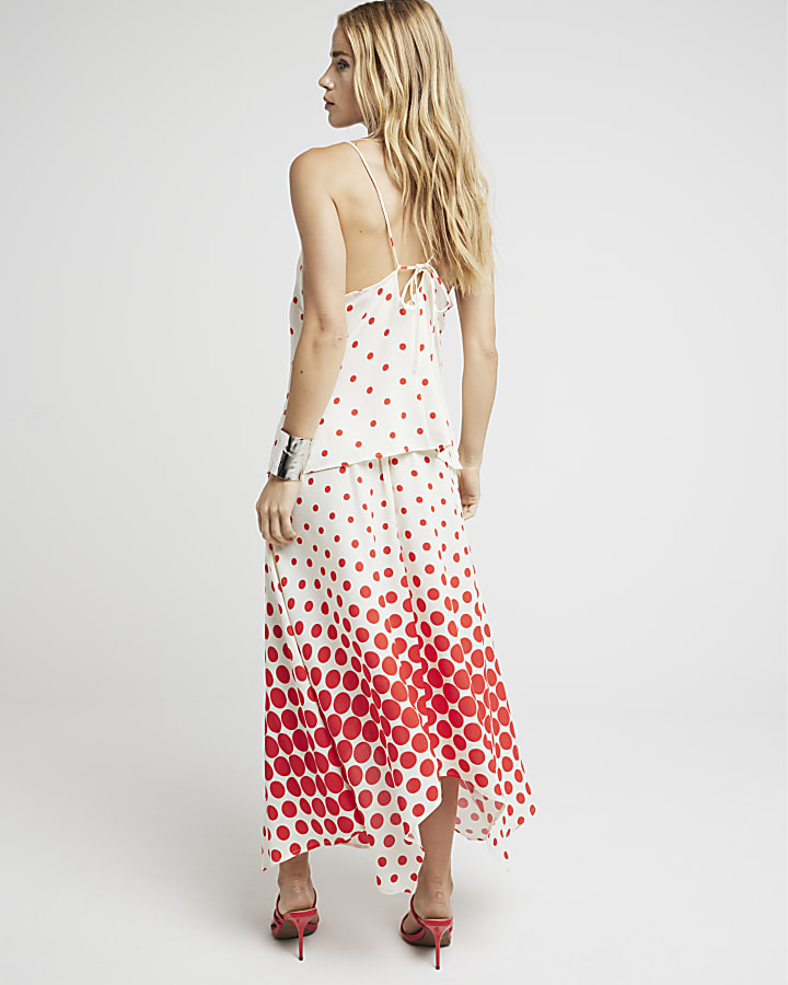 Red spot asymmetric midi skirt