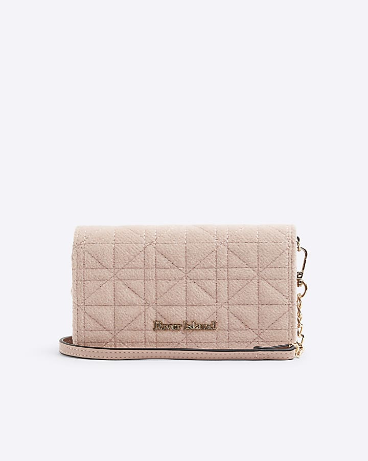 Pink faux wool quilted cross body purse River Island