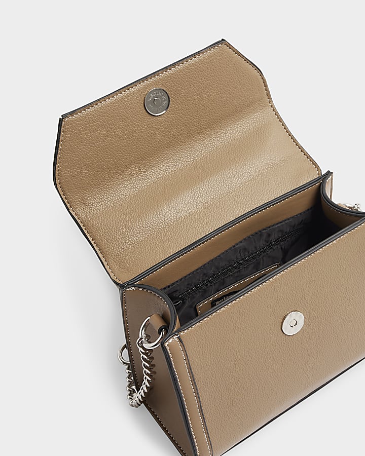 Beige cross body mini top handle bag