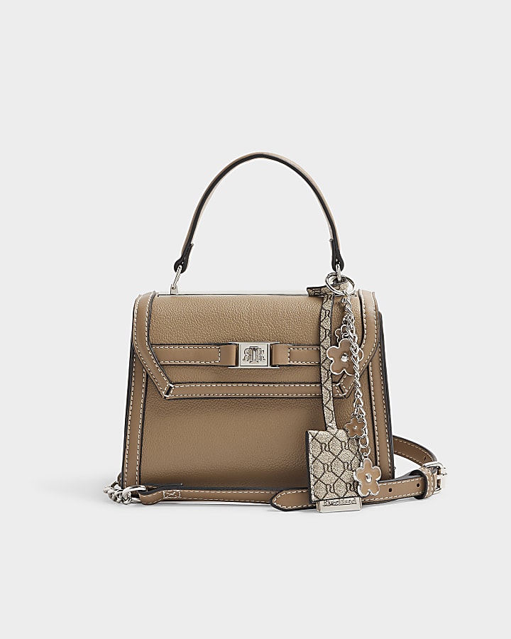 Beige cross body mini top handle bag