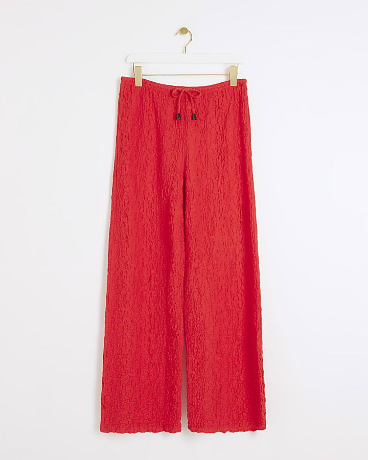 Red textured wide leg trousers