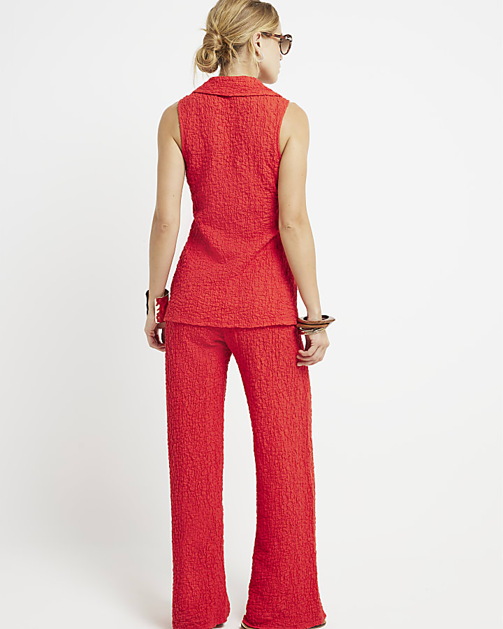 Red textured wide leg trousers