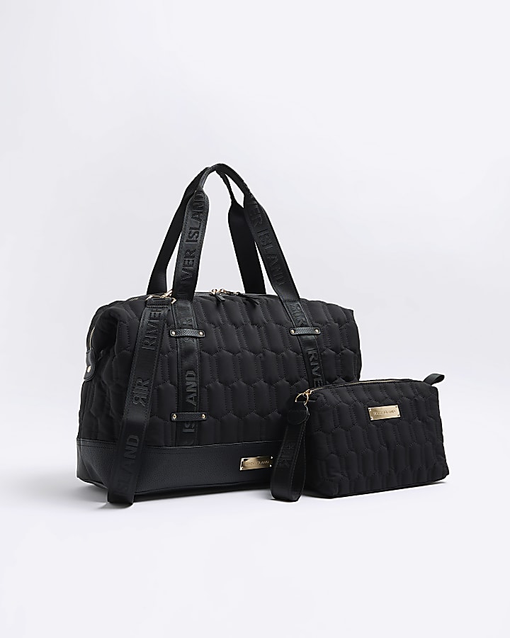 Black quilted travel and makeup bag