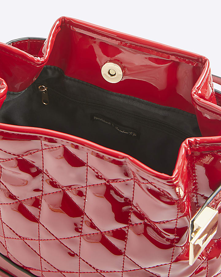 Red patent quilted bucket bag