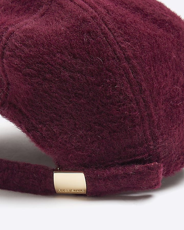 Red fluffy textured cap