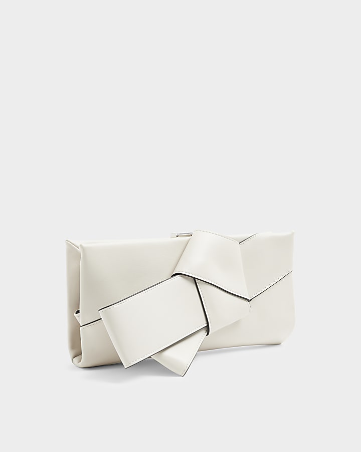 Cream knot detail clutch bag