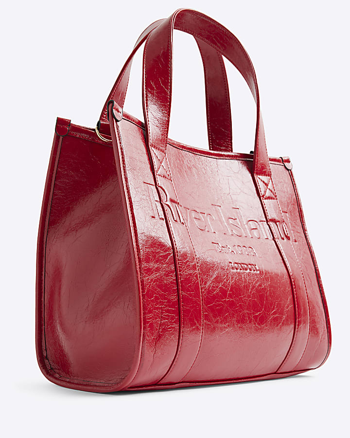 Red embossed tote bag