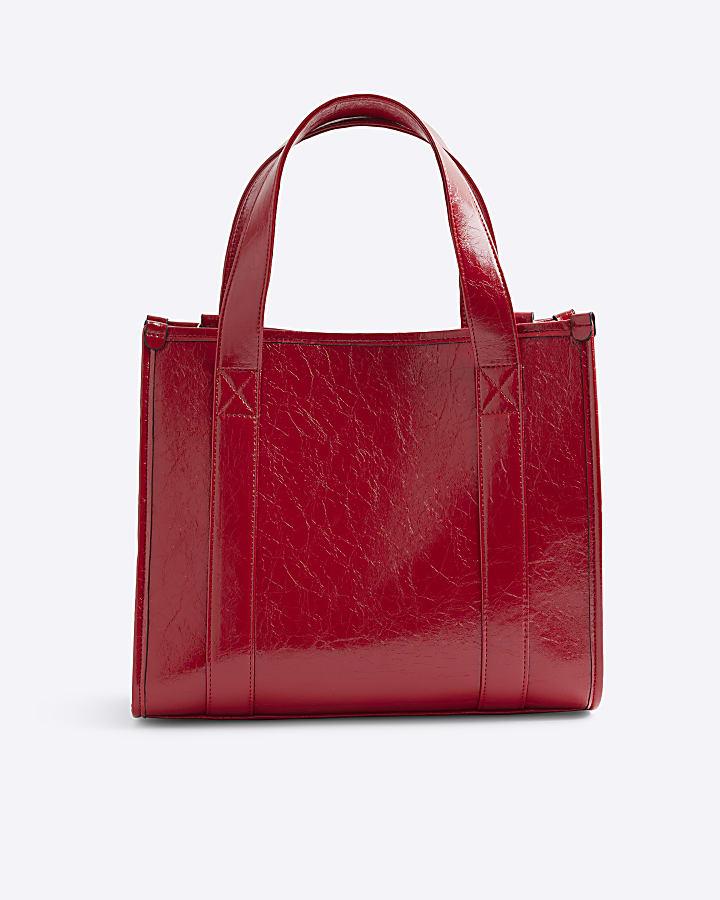 Red embossed tote bag