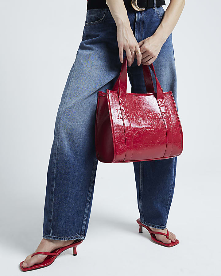 Red embossed tote bag