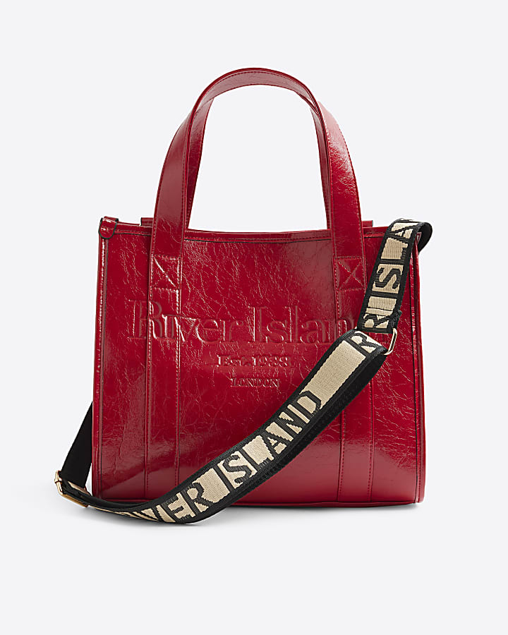 Red embossed tote bag