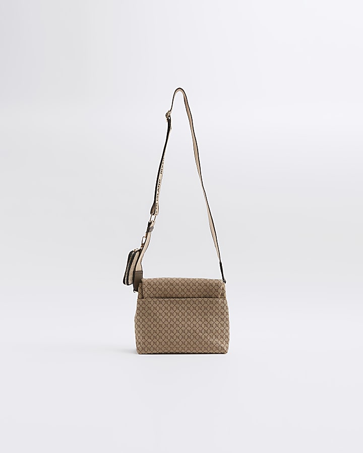 Brown monogram fold over cross body bag