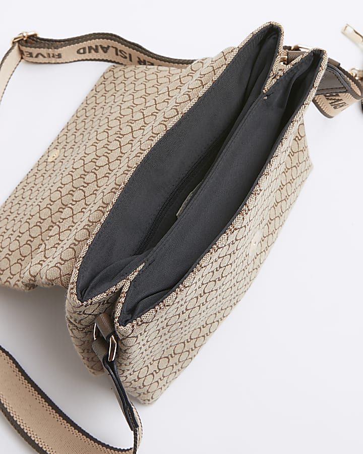 Brown monogram fold over cross body bag