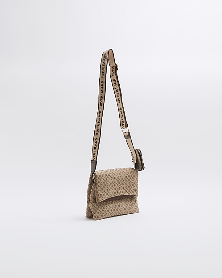 Brown monogram fold over cross body bag