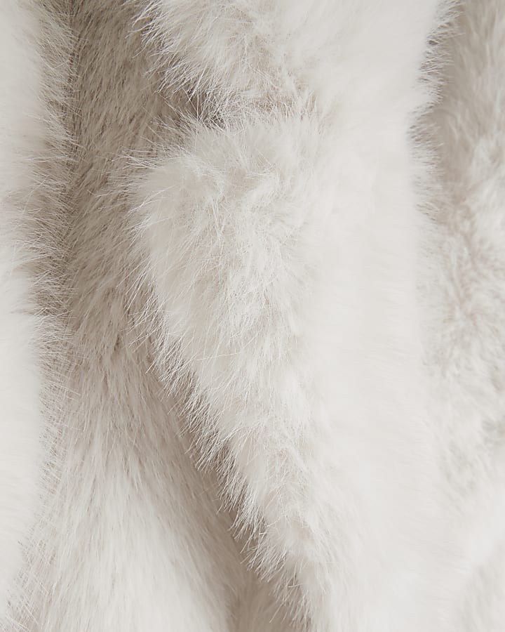 Cream mid length faux fur coat