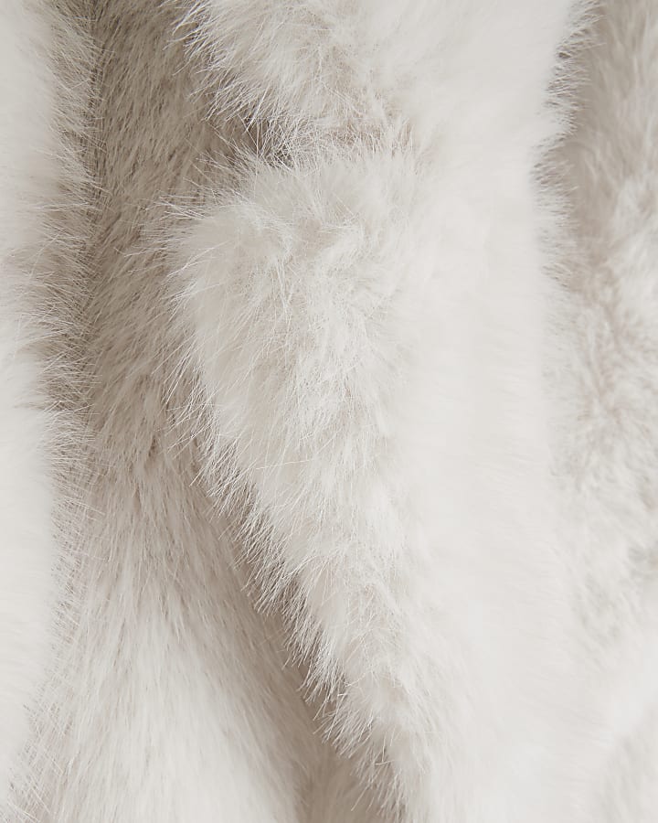 Cream mid length faux fur coat