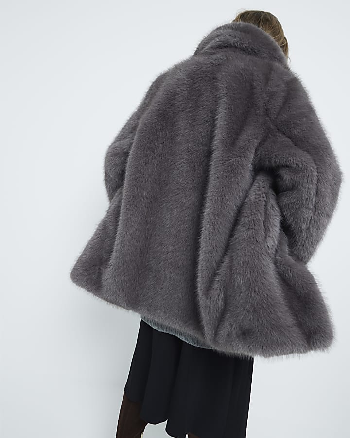 Grey mid length faux fur coat