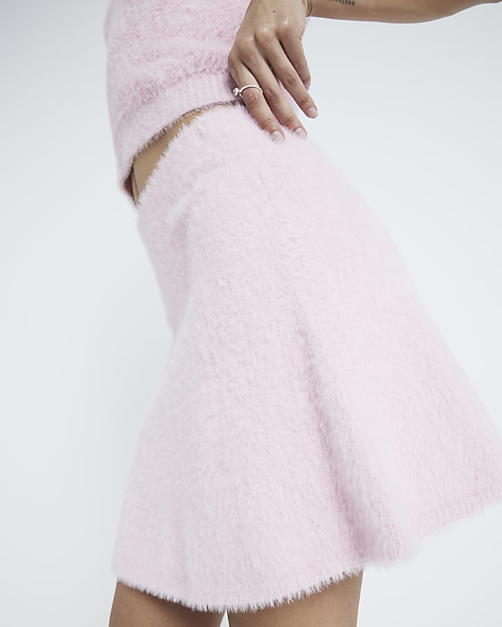 Pink fluffy knit mini skirt