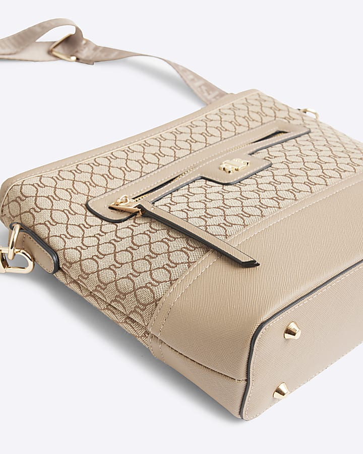 Beige Ri monogram bucket cross body bag