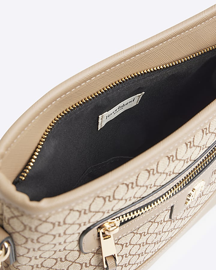 Beige Ri monogram bucket cross body bag