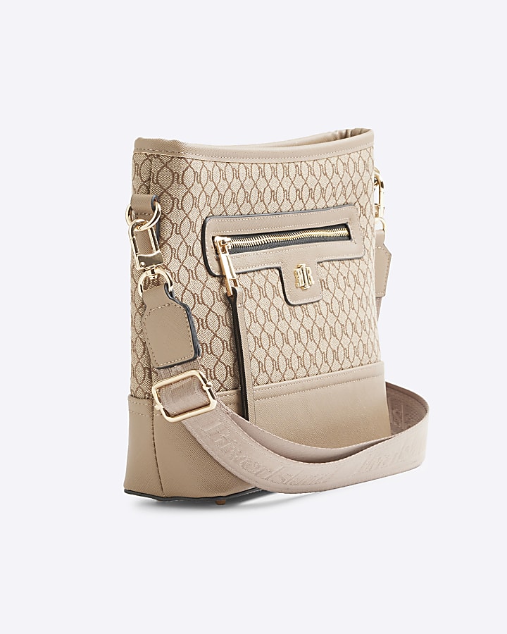 Beige Ri monogram bucket cross body bag