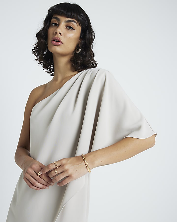 Cream overlay one shoulder jumpsuit