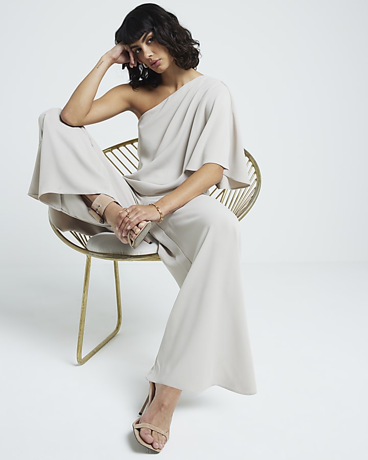 Cream overlay one shoulder jumpsuit