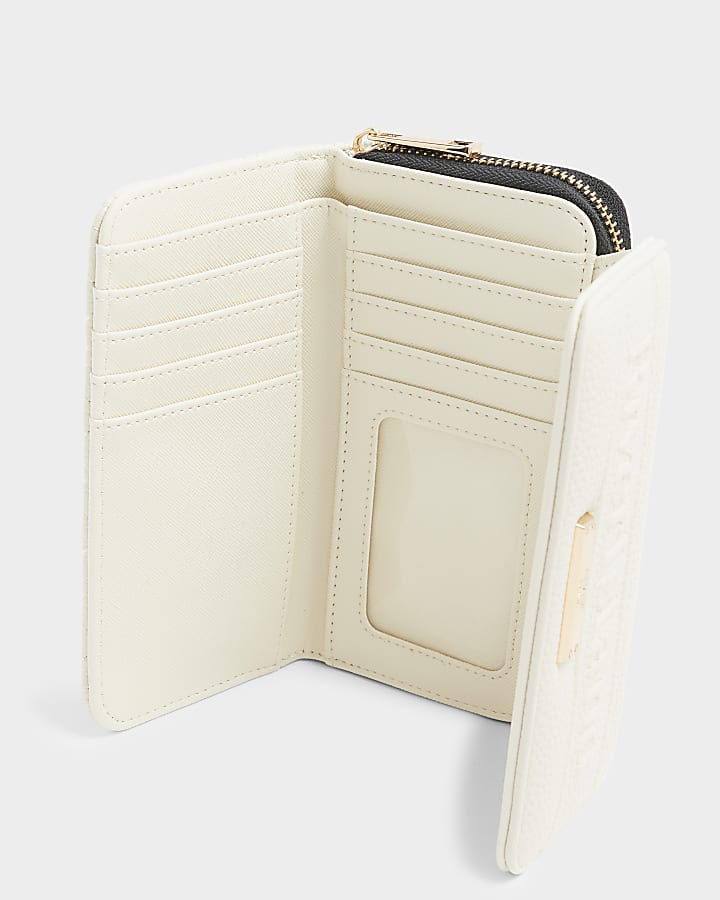 Cream embossed quilted purse