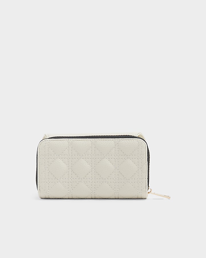 Cream embossed quilted purse