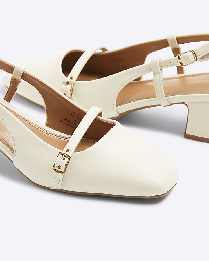 Beige buckle sling back heeled court shoes